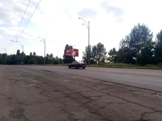 Фото рекламної площини за адресою Драйзера Т. ул., 46 (напротив)