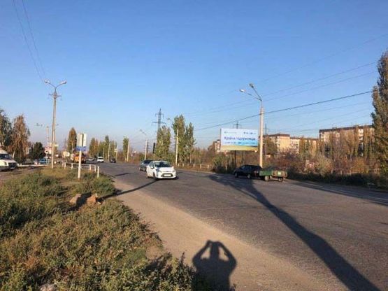 Фото рекламной плоскости по адресу Вечерний бул., 33, (объездная дорога, выезд из ТЦ "СИЛЬПО")