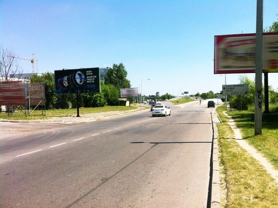 Фото рекламной плоскости по адресу Луганская ул., 200 м. до путепровода (место №7)