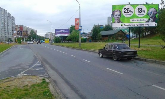 Фото рекламной плоскости по адресу Хуторивка ул., (перед ТЦ "Шувар") АЗС ОККО