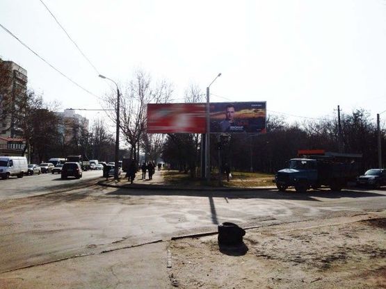 Фото рекламной плоскости по адресу Грушевского ул., 52 (сквер) - Братьев Поджио ул. (правый)