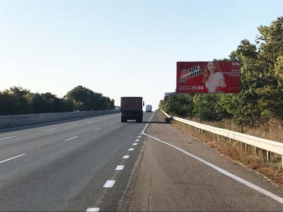 Фото рекламної площини за адресою Киевское шоссе, с. Большая Балка, 200 м. от АЗС "ОККО", 5 км. до Одессы