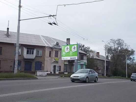 Фото рекламной плоскости по адресу Космическая ул.- Каменная ул. в центр к Проспекту Соборный