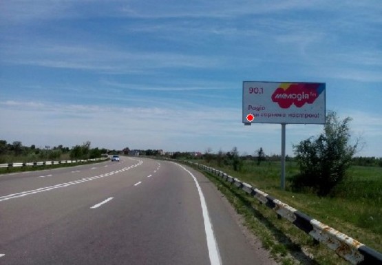 Фото рекламної площини за адресою Автодорога Днепропетровск-Киев, за поворотом Дачи