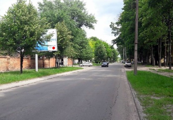 Фото рекламной плоскости по адресу Строителей ул., напротив дома № 33