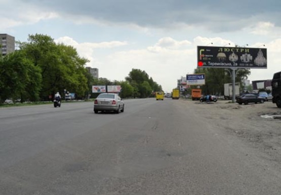 Фото рекламной плоскости по адресу Кольцевая Дорога, 100м к ТЦ МЕТРО