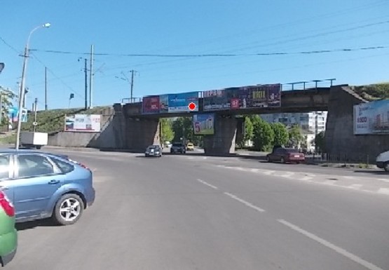 Фото рекламной плоскости по адресу Клепаровская ул. (мост)