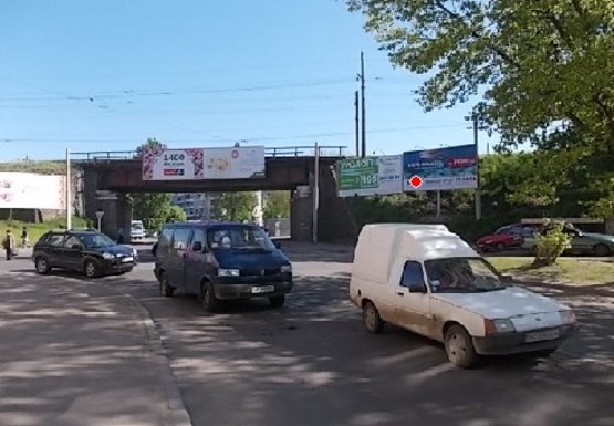 Фото рекламной плоскости по адресу Джерельная ул, возле моста