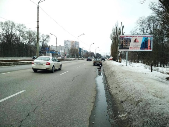 Фото рекламної площини за адресою Донецкое шоссе перед ж/м Фрунзенский №1, (АЗС "Юкон", ресторан "Робин Гуд"), в направл. ул. Радгоспной