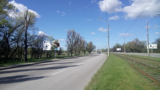 Фото рекламной плоскости по адресу Донецкое шоссе перед ж/м Фрунзенский №1, (АЗС "Юкон", ресторан "Робин Гуд"), в направл. Кайдакского моста