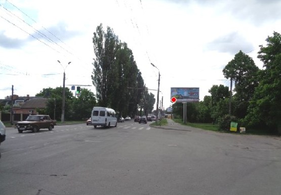 Фото рекламной плоскости по адресу Немировское шоссе - Учительская ул.