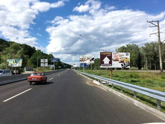 Фото рекламної площини за адресою Дніпровське шосе, перед поворотом на с.Лісники, ресторан "Духм'яна піч", траса Н-01 "Київ-Знам'янка", км 20+500 ліво