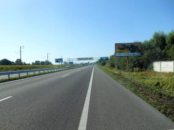 Фото рекламной плоскости по адресу Дніпровське шосе, територія під котеджну забудову, траса Н-01 "Київ-Знам'янка", км 22+000 право