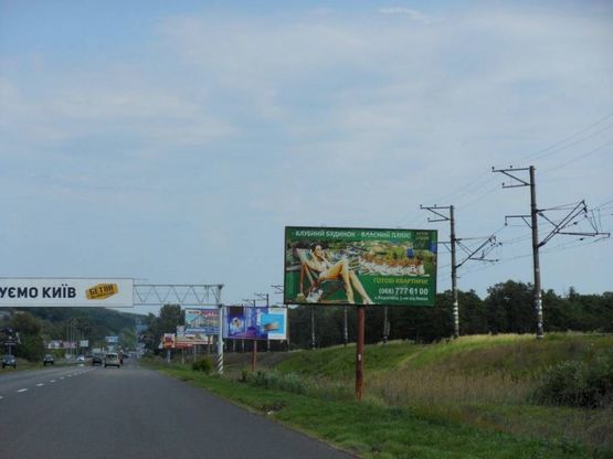 Фото рекламної площини за адресою Дніпровське шосе, територія під котеджну забудову, траса Н-01 "Київ-Знам'янка", км 22+300 ліво