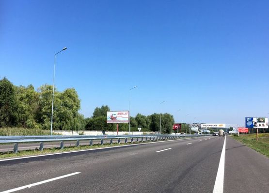 Фото рекламной плоскости по адресу Дніпровське шосе, за АЗК ОККО, траса Н-01 "Київ-Знам'янка", км 22+320 право