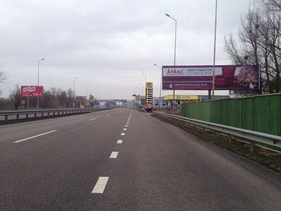 Фото рекламної площини за адресою Дніпровське шосе, км 23+200 право,  перед поворотом на с. Ходосіївка, АЗС БРСМ, садовый центр "Інтерфлора", "МегаМаркет-Ходосіївка"