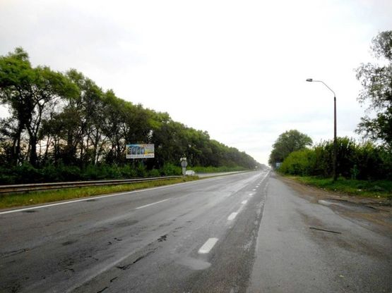 Фото рекламной плоскости по адресу Чернігівська траса, М-01, км 59+300 ліво,  с. Семиполки, перед поворотом на с. Калита, АЗС "АМІК"