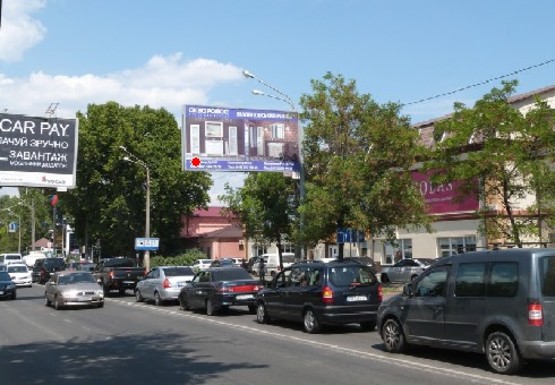 Фото рекламної площини за адресою Люстдорфская дорога, 11/2 - Бреуса ул.