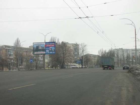 Фото рекламной плоскости по адресу Академіка Заболотного вул., 142, на розподілювачі (в направл. Одеськой пл.)