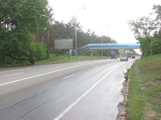 Фото рекламної площини за адресою Столичне шосе,  165 метрів до повороту на вул.Генерала Матикіна