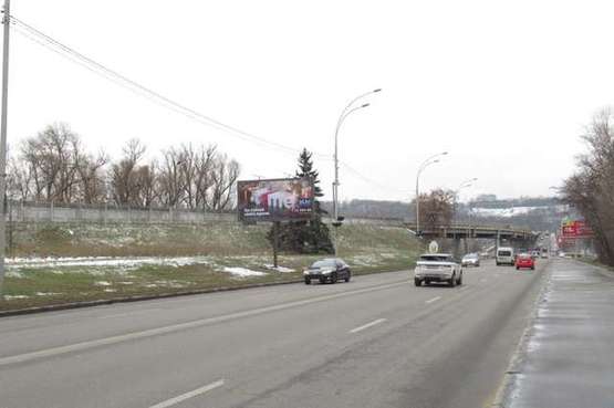 Фото рекламной плоскости по адресу Броварський просп., 100м до мосту Метро  (в напр. моста Метро)