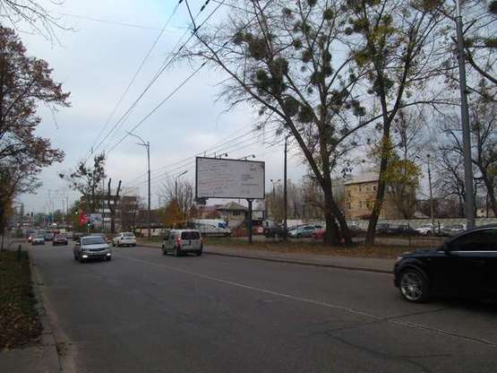 Фото рекламної площини за адресою Святошинська вул., напроти №18