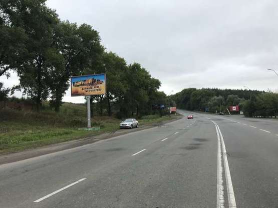 Фото рекламної площини за адресою Кам`янецька вул. (виїзд з міста)