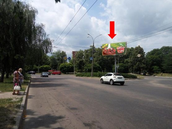 Фото рекламной плоскости по адресу 1-го Мая ул. / ул. Белова, кольцо со стороны ул. Белова, в сторону супермаркетов "Экомаркет", "Вена", в центр