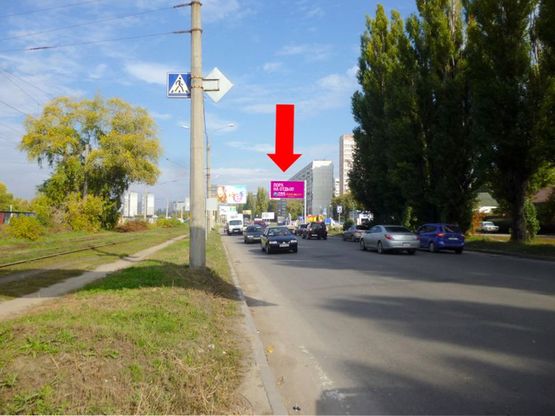 Фото рекламной плоскости по адресу Павлова ул. / Зубенка ул. (бывш. Тимуровцев ул.), из центра