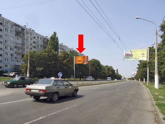 Фото рекламной плоскости по адресу Юбилейный пр. (бывш. 50 лет ВЛКСМ пр.), 72, в центр