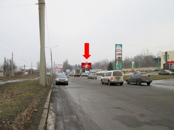 Фото рекламной плоскости по адресу Павлова ул., 88 / Подрывной пер., в сторону рынка "Барабашово"