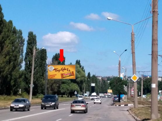 Фото рекламної площини за адресою Тракторостроителей пр., возле гаражного кооператива, в центр