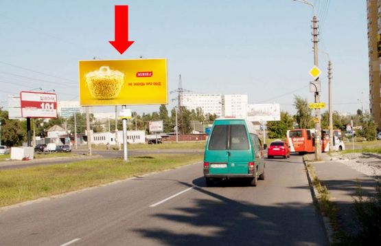 Фото рекламной плоскости по адресу Навои пр. / Жмаченка ул., разделитель, в сторону рынка "Юность"