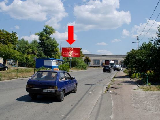 Фото рекламной плоскости по адресу Комбинатная ул. / Каховская ул., единственный выезд из Русановских садов в сторону ст. м. "Левобережная"