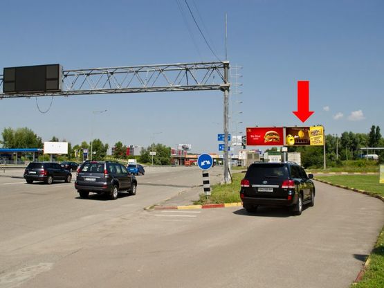Фото рекламной плоскости по адресу Столичное шоссе, перед мостом по Заболотного ул., рядом ТРЦ "Домосфера", в центр, правый
