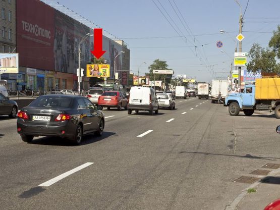 Фото рекламной плоскости по адресу Бандеры пр. (бывш. Московский пр.), 2, напротив супермаркет "Фоксмарт", заезд в ТЦ "Ашан", в центр