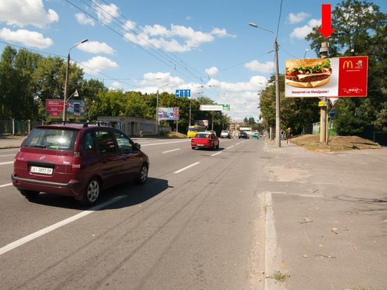 Фото рекламної площини за адресою Мельникова ул., 52, напротив, на светофоре, возле АЗС, в сторону ст. м. "Дорогожичи"