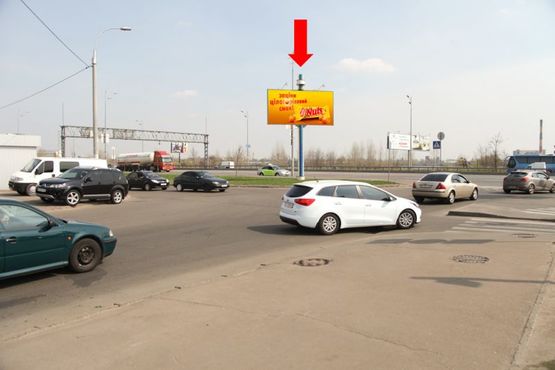 Фото рекламной плоскости по адресу Декабристов ул., выезд на Бажана пр., возле "МакДональдс"