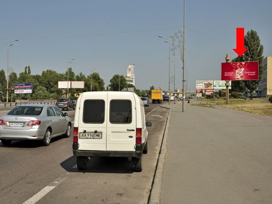 Фото рекламной плоскости по адресу Бажана пр., напротив ул. Коллекторной 1, после ТНК, из центра