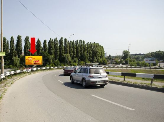 Фото рекламной плоскости по адресу Одесская пл., выезд на Кольцевая дорога, в сторону Глушкова пр.