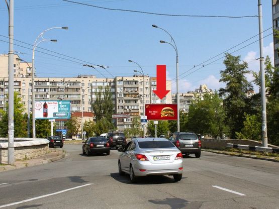 Фото рекламной плоскости по адресу Героев Сталинграда пр., 48 / Героев Днепра ул., в сторону Северная ул.