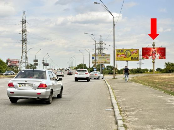 Фото рекламной плоскости по адресу Промышленная ул. / Киквидзе ул., в сторону моста Южного