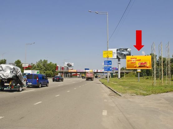 Фото рекламной плоскости по адресу Столичное шоссе / Заболотного ул., в сторону мост Южный, в центр