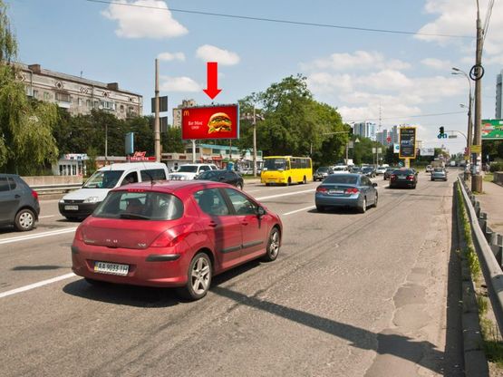 Фото рекламной плоскости по адресу Дегтяревская ул. / Победы пр., светофор, на мосту