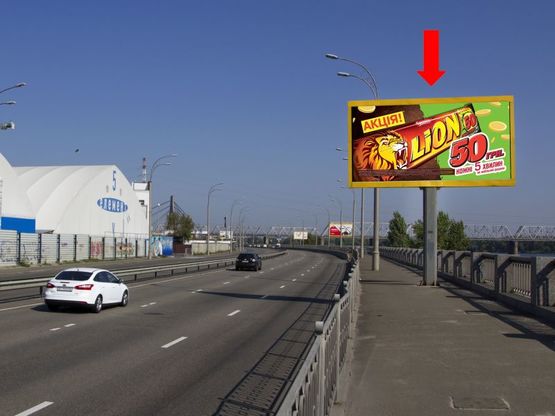 Фото рекламной плоскости по адресу Набережно-Рыбальская ул., 600м до мост Подольско-Воскресенский, напротив клуба "5-й элемент", в сторону мост Московский