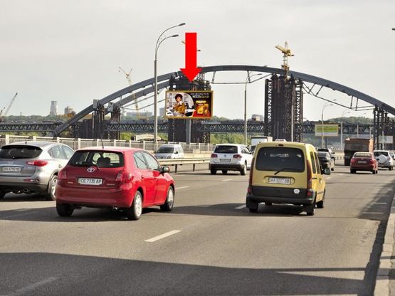 Фото рекламной плоскости по адресу Набережно-Рыбальская ул., 600м до мост Подольско-Воскресенский, напротив клуба "5-й элемент", в сторону Набережно-Крещатикская ул.