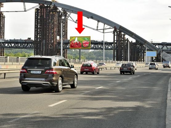 Фото рекламної площини за адресою Набережно-Рыбальская ул., 270м до мост Подольско-Воскресенский, в сторону Набережно-Крещатицкая ул.