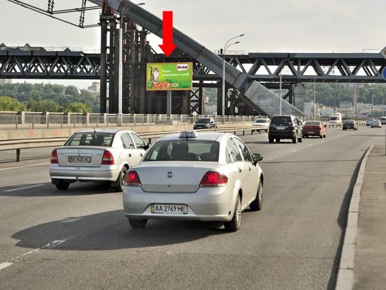 Фото рекламной плоскости по адресу Набережно-Рыбальская ул., 170м до мост Подольско-Воскресенский, в сторону Набережно-Крещаткскцкая ул.