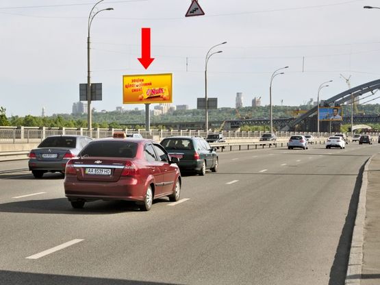 Фото рекламної площини за адресою Набережно-Рыбальская ул., 900м до мост Подольско-Воскресенский, в сторону Набережно-Крещатикская ул.