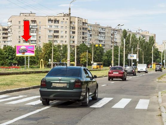 Фото рекламной плоскости по адресу Симиренка ул., 16, в сторону рынка, ТРЦ "Караван"